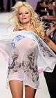 Pamela Anderson Flashes Nipples
