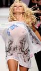 Pamela Anderson Flashes Nipples